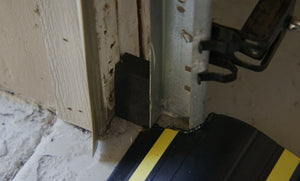 Close up of foam side block inserts installed inside a garage door